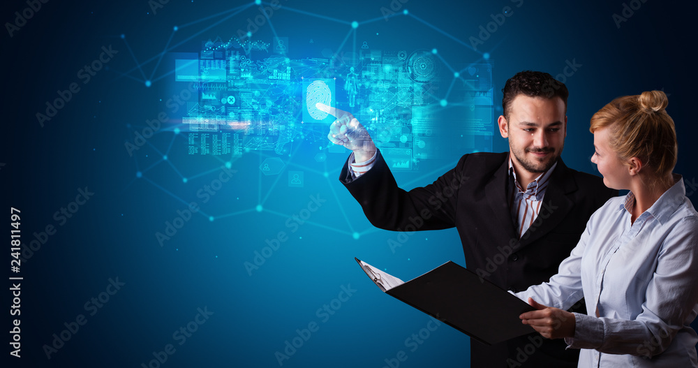 Man and woman accessing modern hologram personal database with fingerprint identification Man and woman accessing modern hologram personal database with fingerprint identification