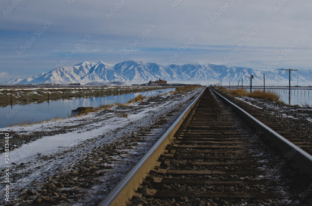 Down the long rail road tracks in the cold winter wasteland of the great salt lake basin. 