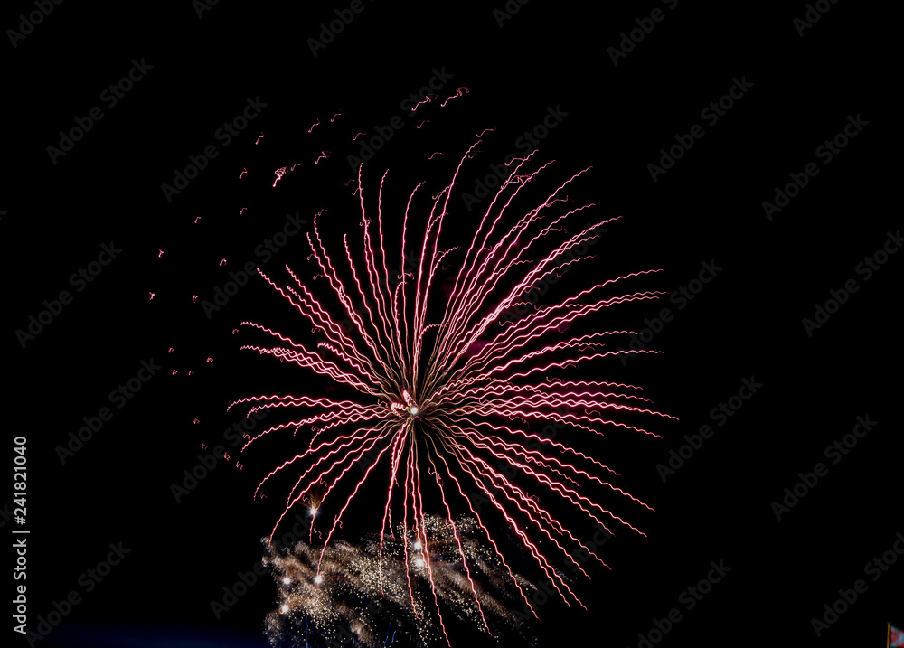 New year holiday fireworks on the banks of the Neva river in St. Petersburg.