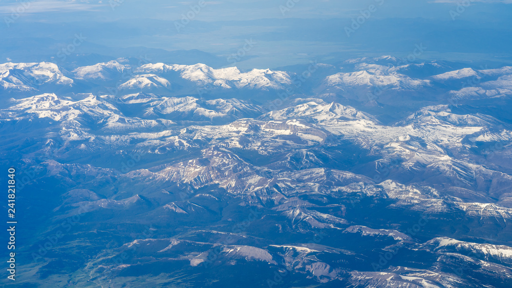 Mountain ranges, view from the plane. Window seat