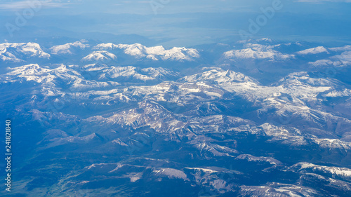 Mountain ranges, view from the plane. Window seat © Sergei