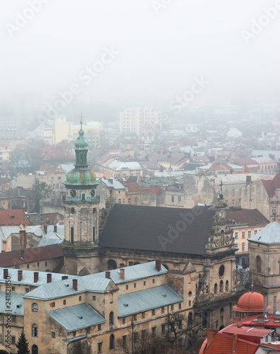 Old European city in the fog. Lviv, Ukraine