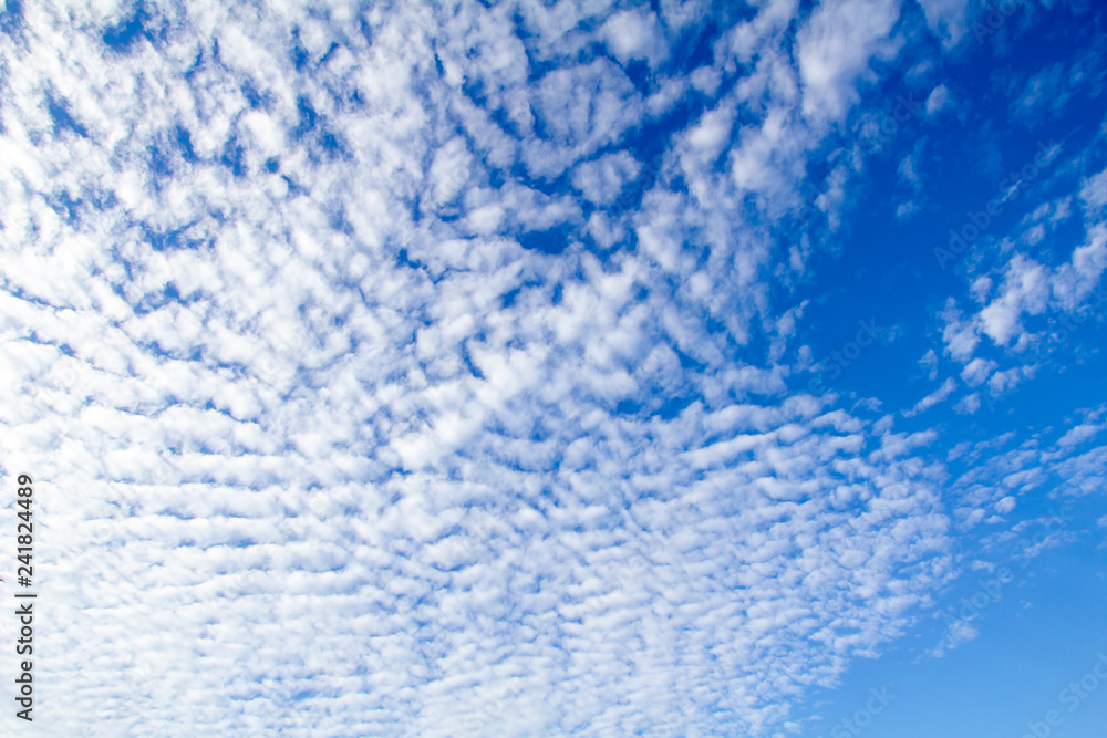 Sunshine clouds sky during morning background. Blue,white pastel heaven,soft focus lens flare sunlight. Abstract blurred cyan gradient of peaceful nature