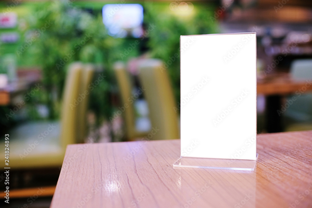Menu frame standing on wood table in Bar restaurant cafe. space for text marketing promotion. Menu frame standing on wood table in Bar restaurant cafe. space for text marketing promotion.