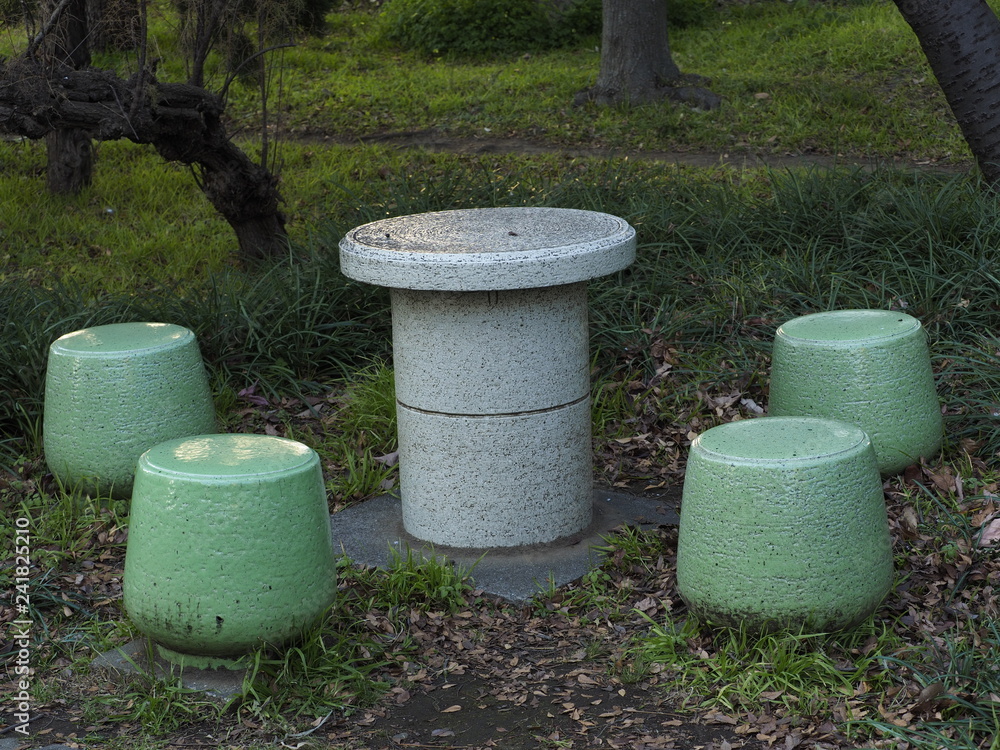 table and chairs in the park