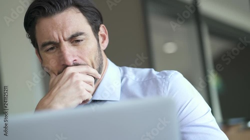 Businessman working on laptop
