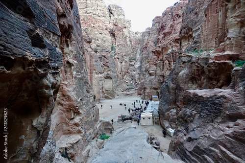 Climing on the rocks of Petra.