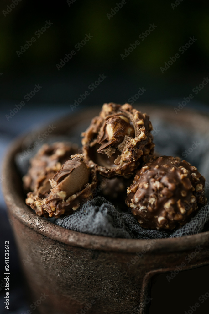 chocolate dessert with nuts on a dark background. copy space