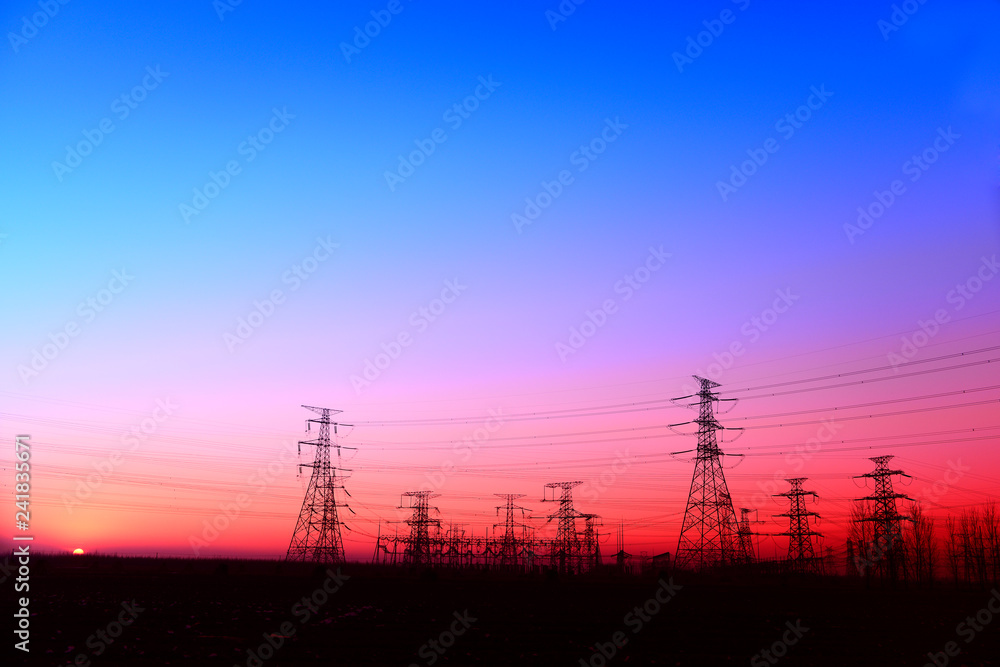 Fototapeta premium High piezoelectric towers, in the setting sun