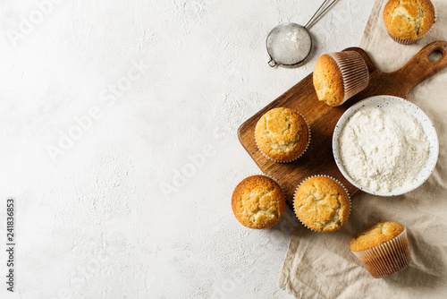 Homemade tasty miffins on white background
