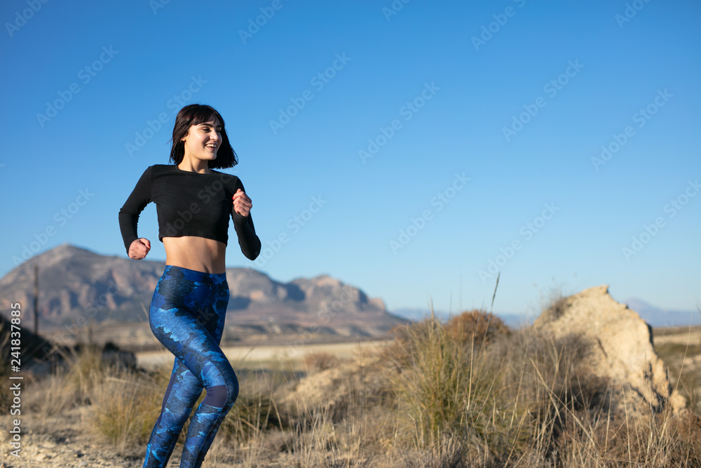 Woman doing sport and relaxing outdoors Woman doing sport and relaxing outdoors