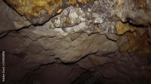 Uranium ore in a uranium mine. Rock containing uranium and barite. photo