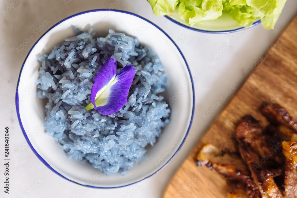 Butterfly pea purple sticky rice, decorated with Butterfly pea flower ...