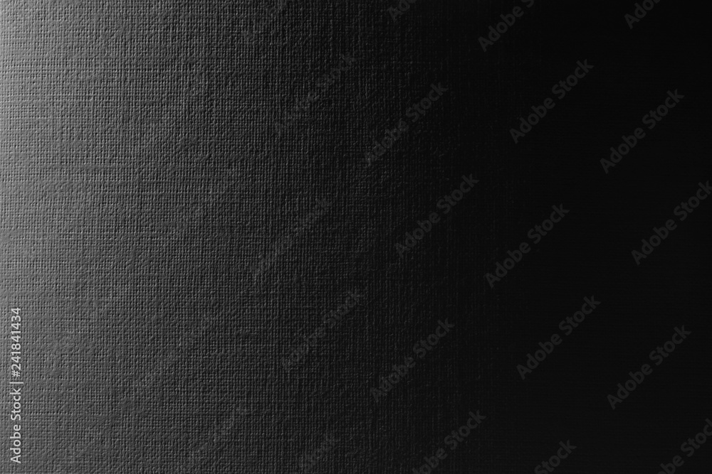 texture background perforated paper with imitation of canvas, embossed in hard light with sharp transition to black. texture background perforated paper with imitation of canvas, embossed in hard light with sharp transition to black.
