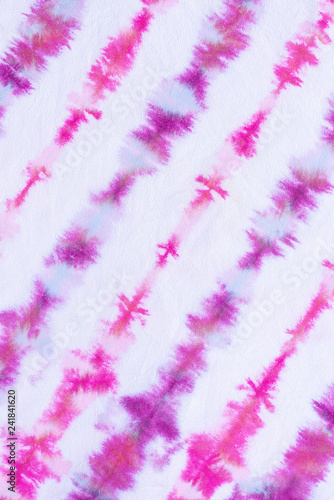 striped tie dye pattern hand dyed on cotton fabric abstract background.