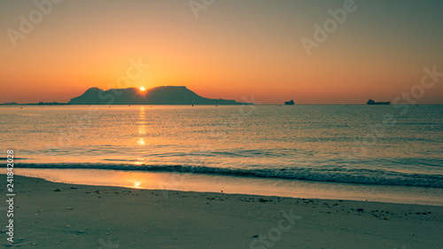 Amazing panoramic view on the rock of Gibraltar during sunset and the ships around it.
