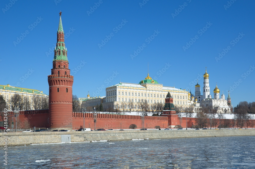 View of the Moscow Kremlin and The Kremlin embankment on a Sunny spring day, Moscow, Russia View of the Moscow Kremlin and The Kremlin embankment on a Sunny spring day, Moscow, Russia