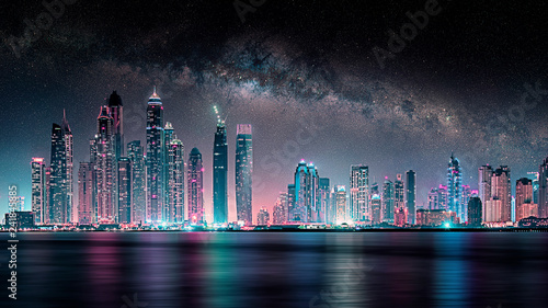 Night in Dubai city under the milky way