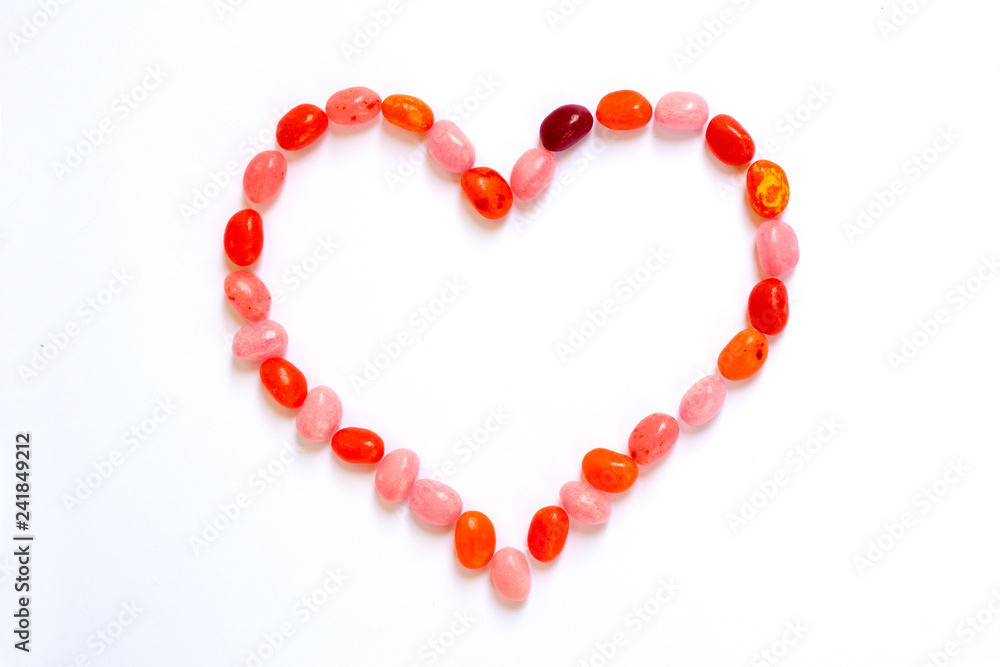 Heart shape made of jelly beans isolated on white Heart shape made of jelly beans isolated on white