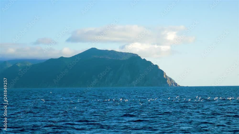 High rocky Cape Aniva on Sakhalin Island with sea lighthouse. High rocky Cape Aniva on Sakhalin Island with sea lighthouse.