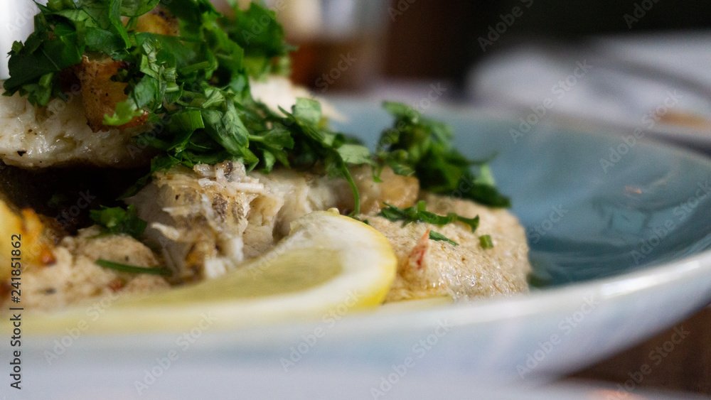 Plate of typical Lebanese hummus seasoned in various ways Plate of typical Lebanese hummus seasoned in various ways