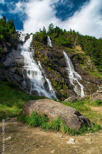 waterfall  landscape forest in trentino with dolomiti mountain