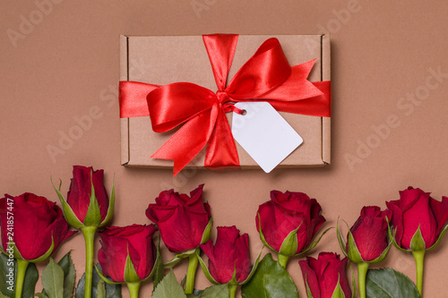 Wallpaper Mural Valentines day gift ribbon bow tag, seamless nude background red roses, free copy text space Torontodigital.ca