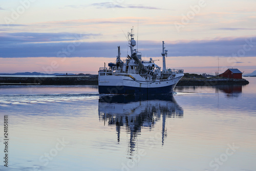 Fishing boat at sunset in Brønnøy municipality, Nortdland county