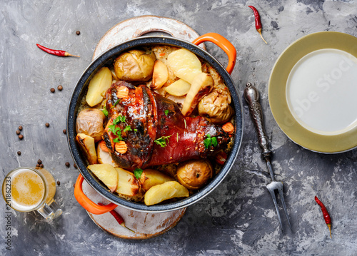 Photography Pork knuckle with fried sauerkraut
