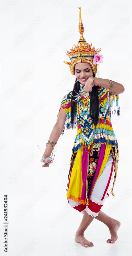 The lady is wearing Southern thai classical dancing suit is posing Southern Thai basic pattern on background