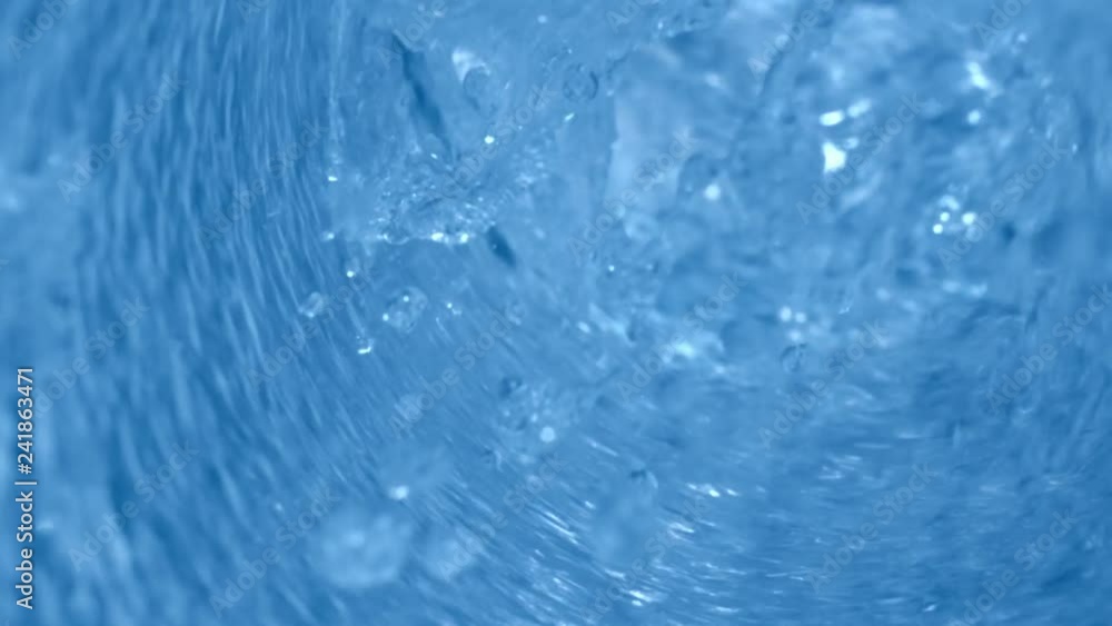 Purified Water Pouring Down with Bubbles Macro Shot with High Speed Camera Purified Water Pouring Down with Bubbles Macro Shot with High Speed Camera