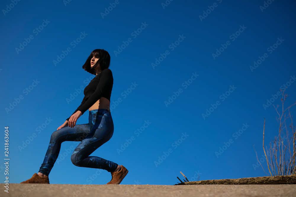 Woman doing sport and relaxing outdoors Woman doing sport and relaxing outdoors