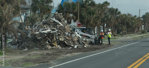 Debris Pile Along Highway on Gulf Coast in the Aftermath of Hurricane Michael photo