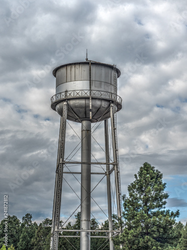 Water tower against stormy sky, Flagstaff Arizona