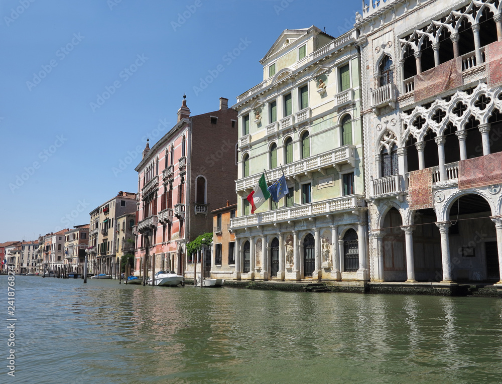 Fototapeta premium 20.06.2017, Venice, Italy: View of historic buildings and canals from gondola