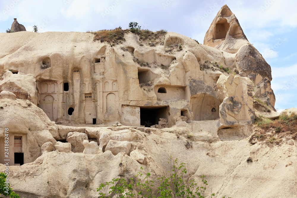 Old ancient cave temple in the mountain valley of Cappadocia Old ancient cave temple in the mountain valley of Cappadocia