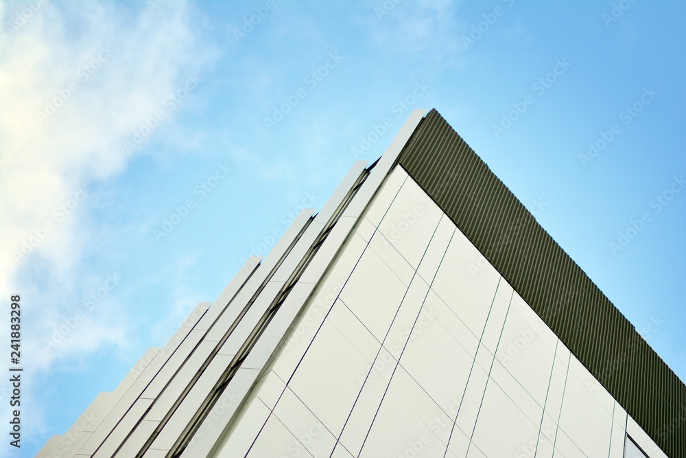 Modern office building on a clear sky background Modern office building on a clear sky background