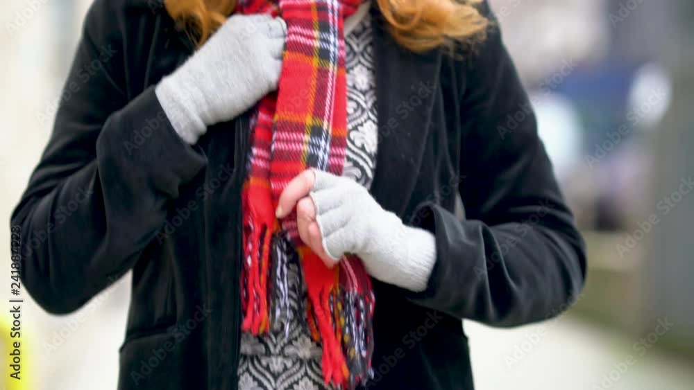 British fashion ginger female model with hat walking the streets of London British fashion ginger female model with hat walking the streets of London