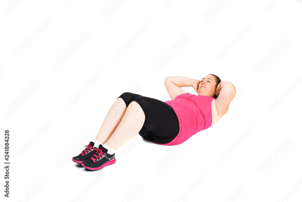 Fat woman doing physical exercises