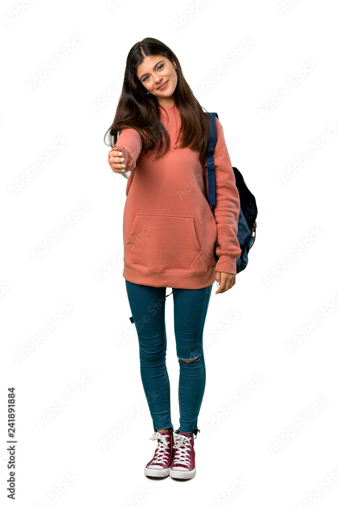 A full-length shot of a Teenager girl with sweatshirt and backpack shaking hands for closing a good deal A full-length shot of a Teenager girl with sweatshirt and backpack shaking hands for closing a good deal