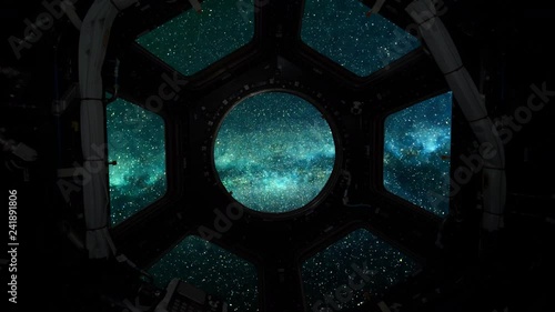 CGI depiction of space flight into a star field captured through a space shuttle window.