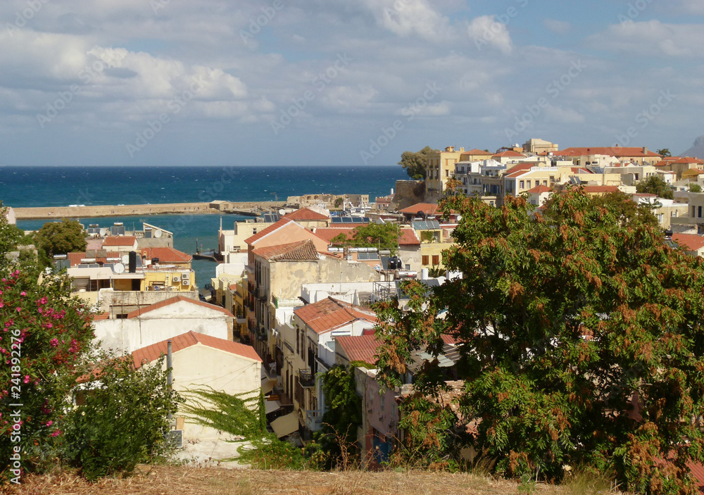 View of the road to the sea through the houses, Chania