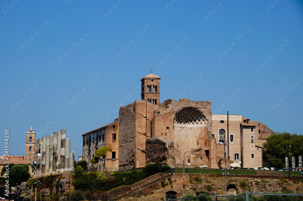 photo of view from the Colosseum on the Temple of Venus and Roma, Rome, Italy, summer