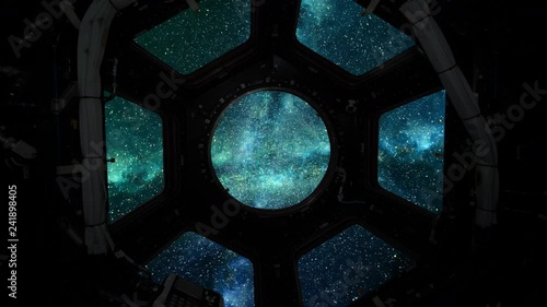 CGI depiction of space flight into a star field captured through a space shuttle window.