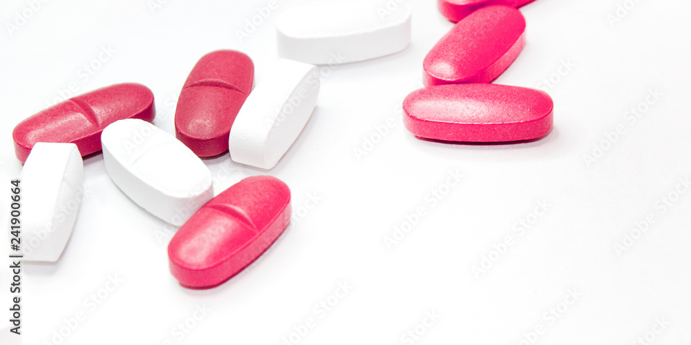 colorful medical pills, on white background, closeup colorful medical pills, on white background, closeup