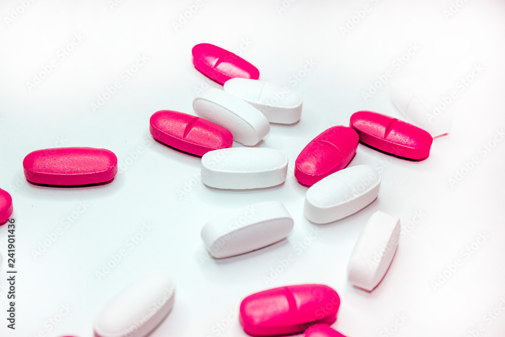 colorful medical pills, on white background, closeup colorful medical pills, on white background, closeup