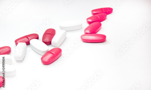 colorful medical pills, on white background, closeup