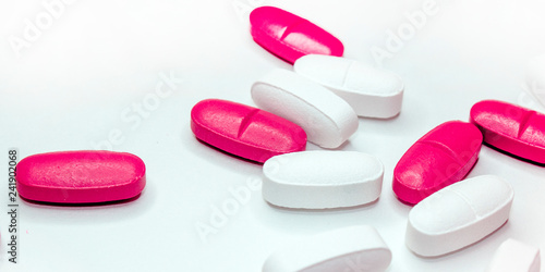 colorful medical pills, on white background, closeup