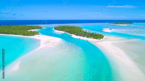 AERIAL: Flying towards One Foot Island and locals partying in their boats. © helivideo
