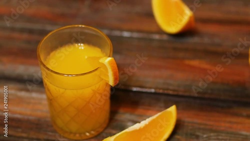 Fresh organic orange juice. Homemade citrus orange juice in glasses on table.